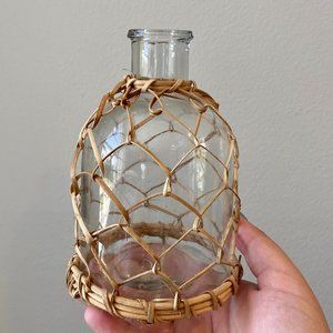 Glass Vase with Woven Wicker around it.